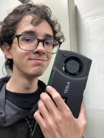 Me holding a Nvidia Tesla